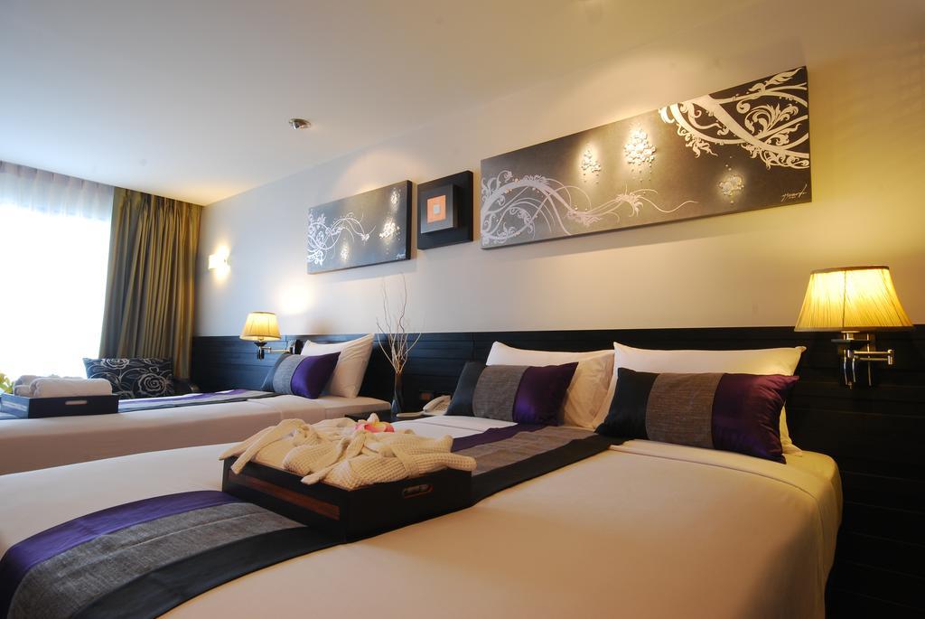 Habitación Triple Deluxe Grand